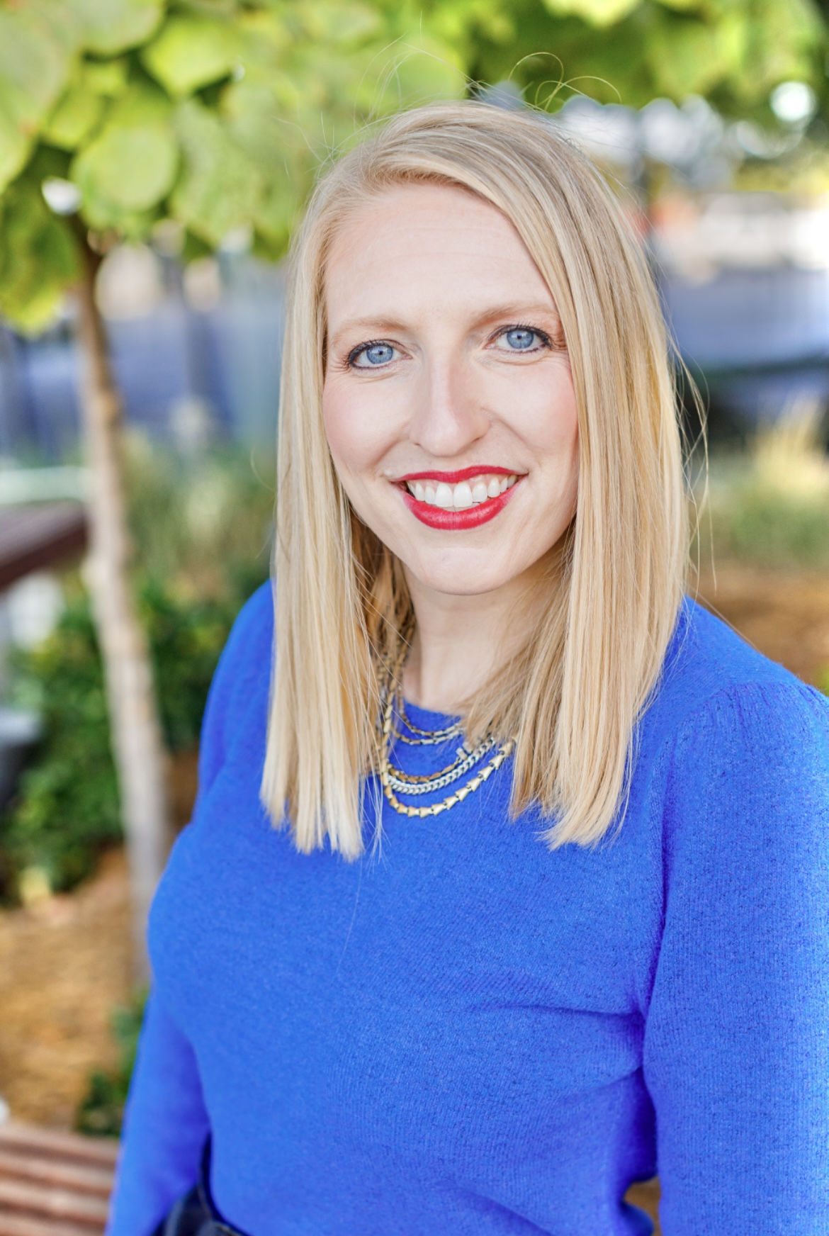Leigh Peek smiling outdoors